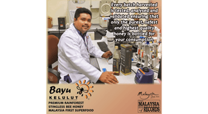 Person in a lab setting with honey products and text about honey quality, featuring the Bayu Kelulu brand.